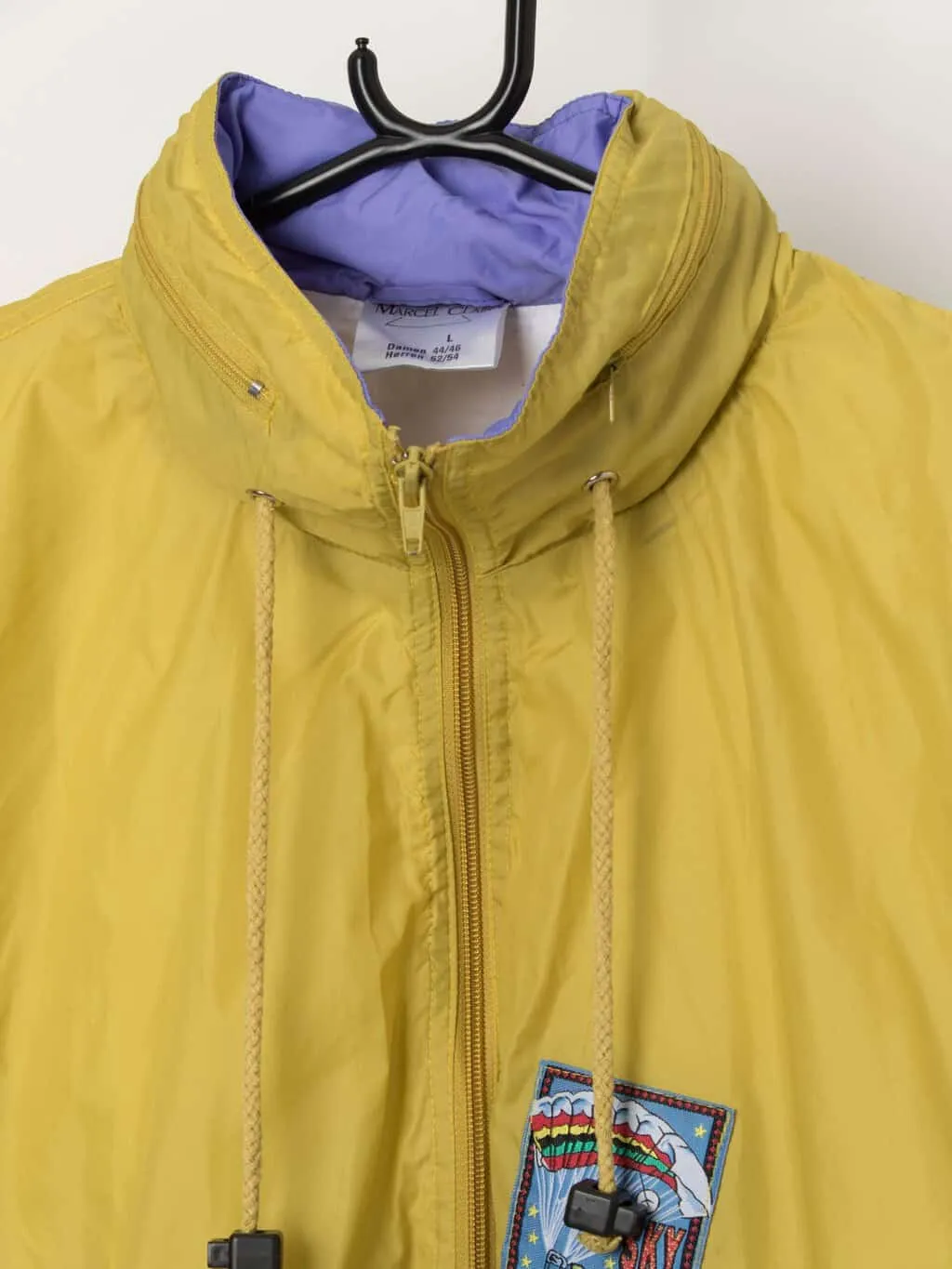 Vintage 80s yellow colour block shell jacket with sky diving patch on the front – Large